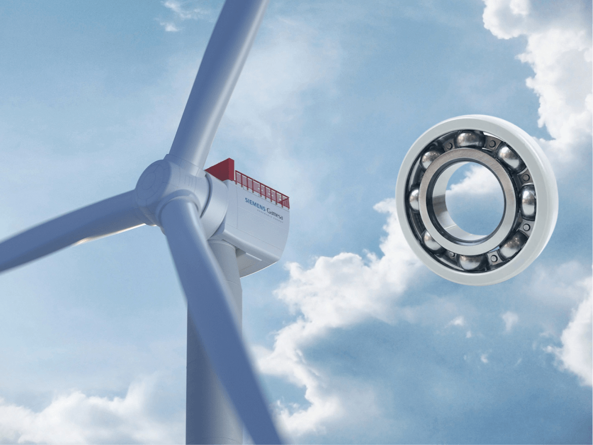 the image shows a wind turbine and an insulated ball bearing for wind turbine