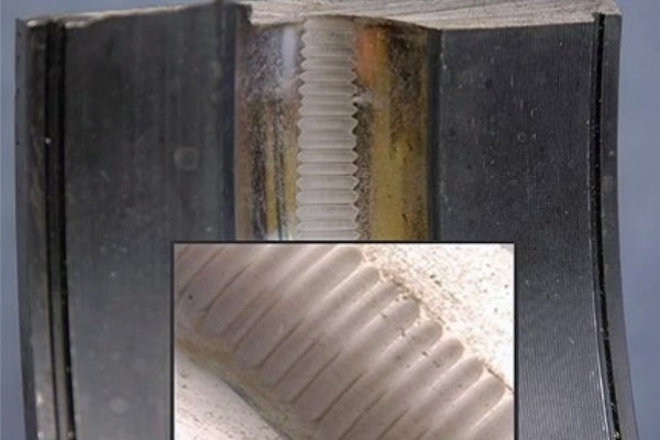 Bearing race showing washboard-like fluting pattern caused by stray VFD currents.