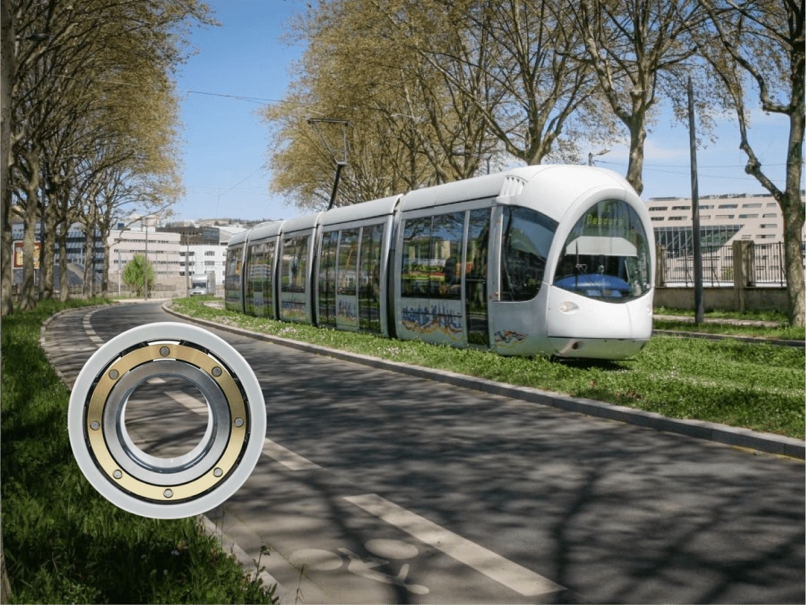 The image shows a rail trancit and an insulated ball bearing with brass cage.