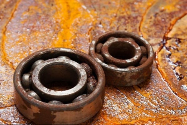 Severely rusted motor bearing due to exposure to moisture and harsh chemicals.