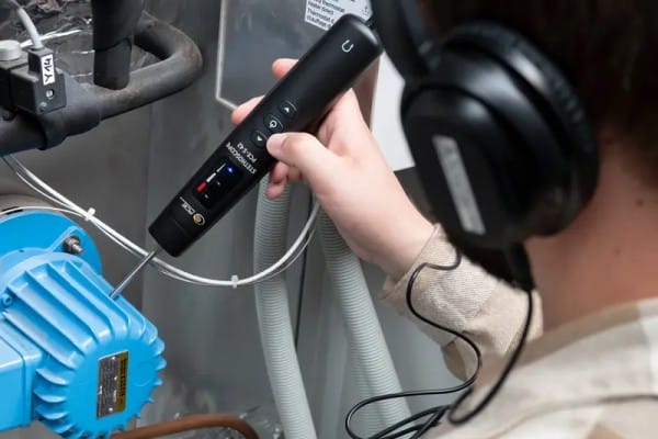 Engineer inspects motor bearing faults