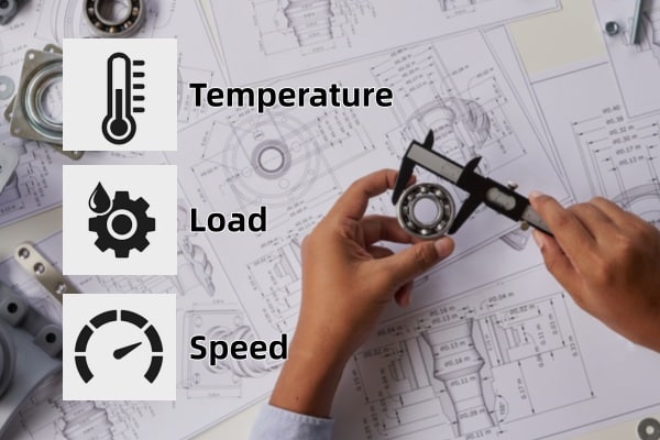 illustration showing an electric motor bearing highlighting key stress points of heat, mechanical load, and rotational speed