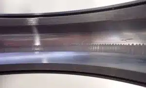 electrical fluting on a motor bearing outer ring raceway caused by bearing current discharge